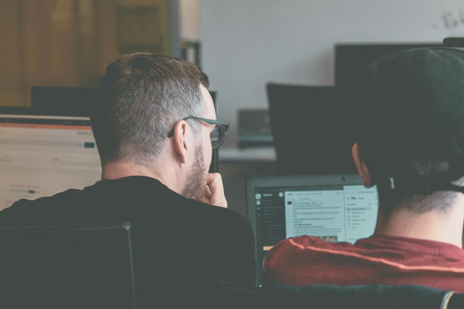 Evening classroom session with financial analysis discussion